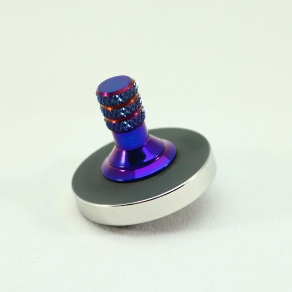 Blacked out and polished stainless steel with a heat anodized titanium spindle #3 - Kemner Design