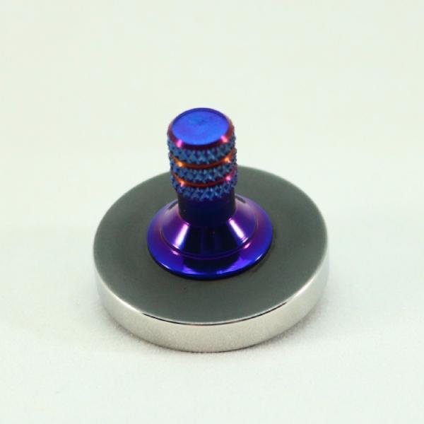 Blacked out and polished stainless steel with a heat anodized titanium spindle #3 - Kemner Design