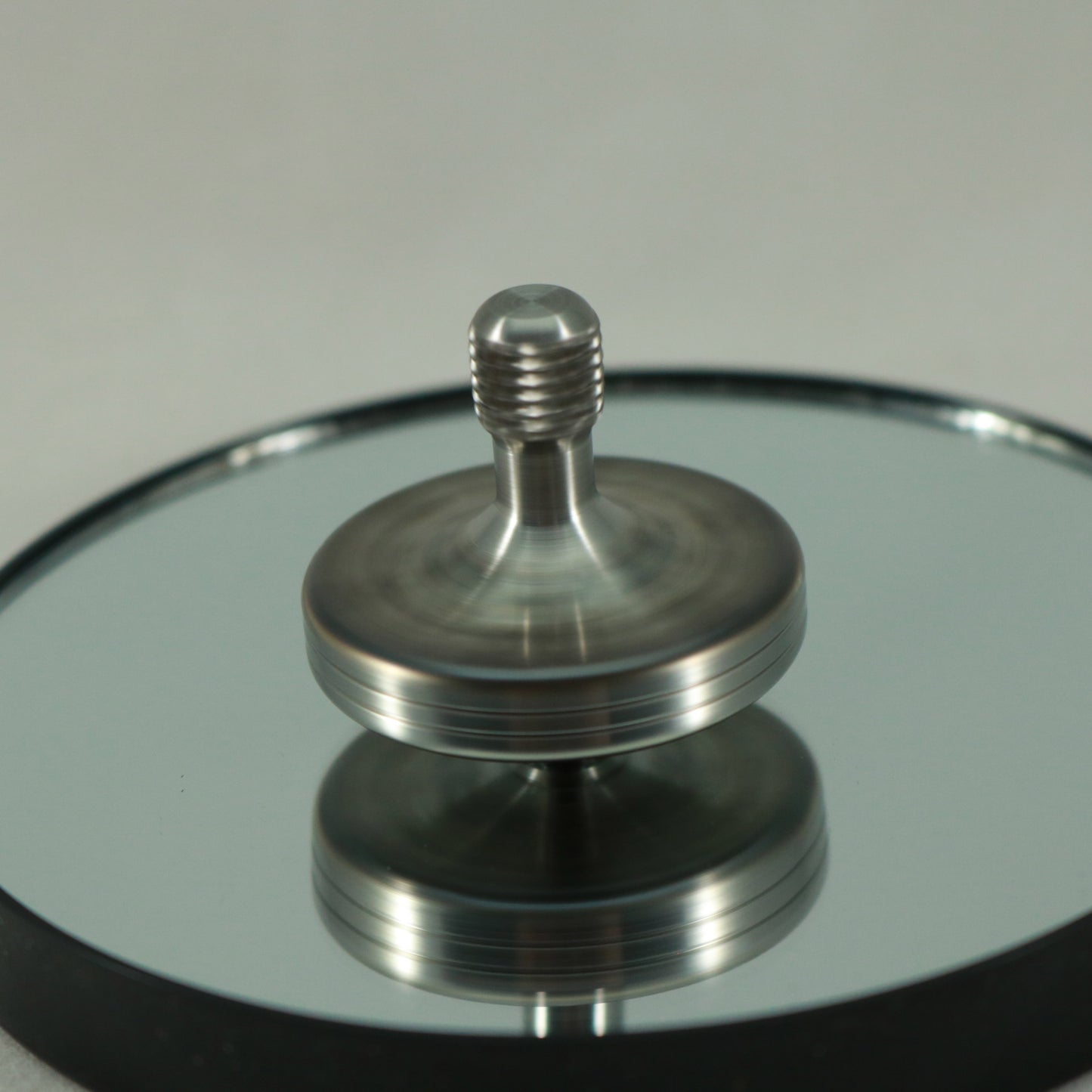 S2- Laser Etched  Inverted Snowflake on a Stainless Steel Spinning Top