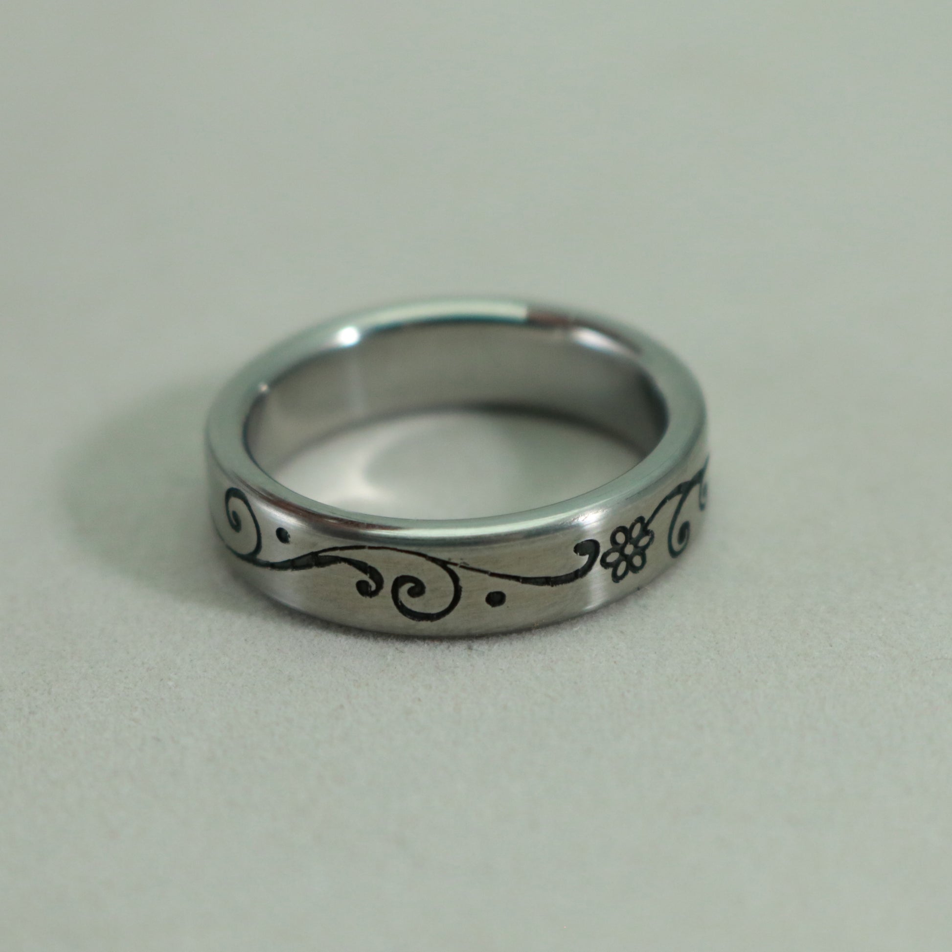 Laser engraved ladies size US 7 1/4 ring by Kemner Design